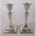 Pair of ornate silver candlesticks Birmingham 1973 (weighted base) maker S J Rose & Son H 19 cm
