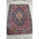 A Hamadan rug with all-over design and central medallion, on a blue ground, 50" x 70" approx