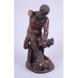 A 19th century carved lime wood figure of Hercules slaying the Lernaean Hydra, 10" high (arm missing