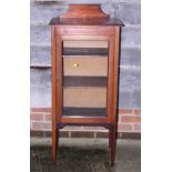 An Edwardian mahogany and inlaid display cabinet enclosed single glazed door, on square tapered