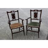 A pair of Edwardian walnut and inlaid splat back elbow chairs, on splay stretchered supports, and an