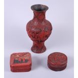 A Chinese red cinnabar lacquer baluster vase decorated with mountainous village scene, 10" high,