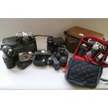 A collection of cameras and camera equipment, by Olympus, Minolta and others