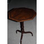 A George III mahogany octagonal top occasional table, on slender turned column and tripod splay