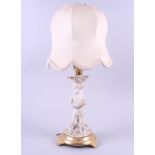 A Continental bisque porcelain figure table lamp, on gilt base, 13" high