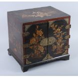 A collector's 19th century Japanese lacquered cabinet, fitted drawers, on bracket feet, 11" wide