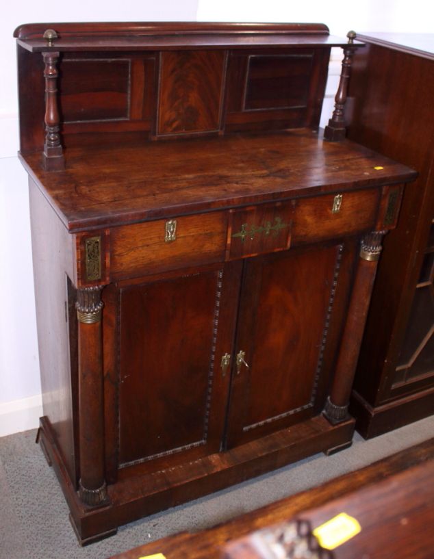 A Regency rosewood & brass inlaid chiffonier with ledge back, fitted shelf over two drawers and