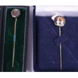 Two Victorian silver stick pins, one enamelled with a terrier