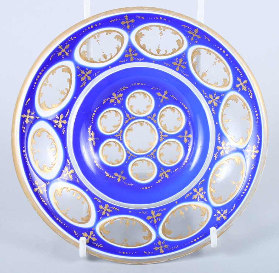 A Continental blue and white overlaid cut glass and gilt decorated ice plate, 6 1/2" dia