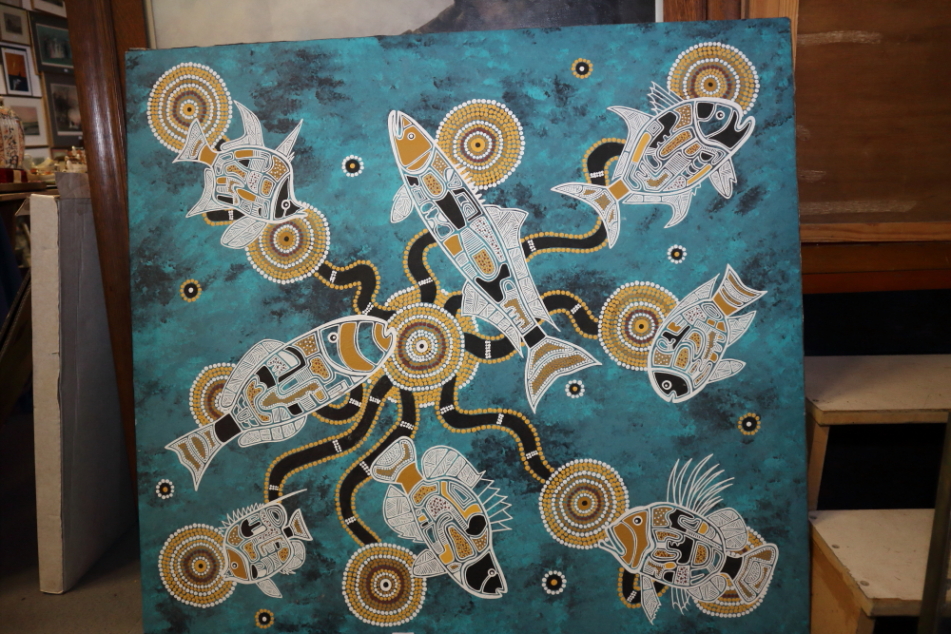 A 20th century acrylic on canvas, Aboriginal dot pattern fish, indistinctly signed, 41 1/2" x 45 1/