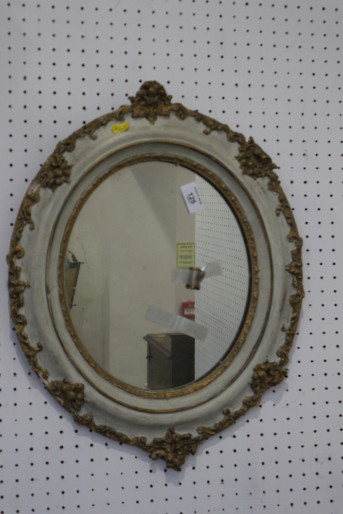 A Gothic design wall shelf, two embroidered footstools and an oval wall mirror, in painted and - Bild 2 aus 2