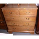 An Edwardian ash chest of two short and three long graduated drawers, with brass bail handles, on