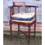 A late 19th century mahogany and line inlaid corner elbow chair