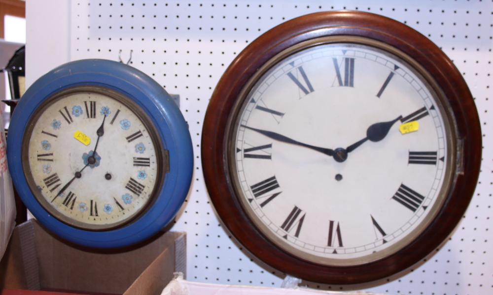 A mahogany cased circular wall clock with fusee movement and white enamel dial and a smaller