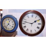 A mahogany cased circular wall clock with fusee movement and white enamel dial and a smaller