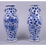 A pair of 19th century Chinese blue and white porcelain vases, decorated floral motifs and