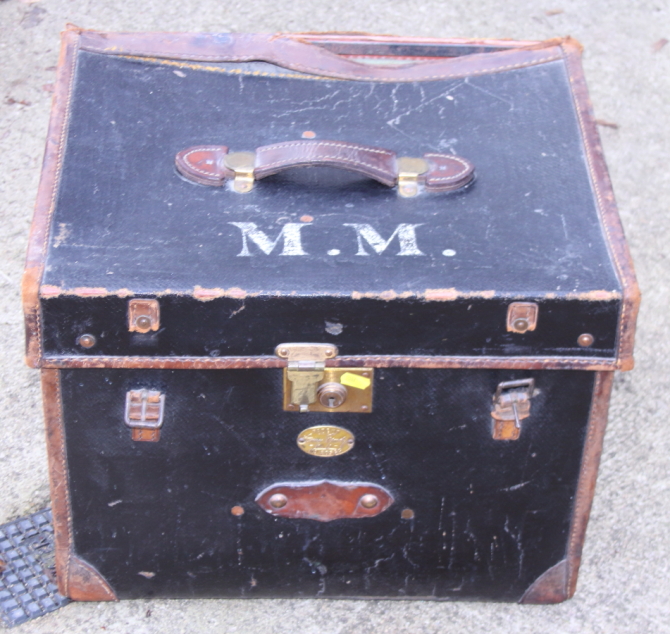 A 19th century canvas and leather bound hat box, by Fanny Moody, 20" wide