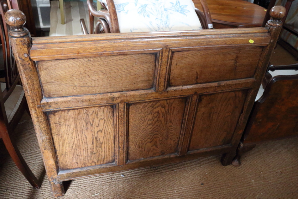 A Liberty & Co style oak single bed head and footboard, with Liberty & Co base mattress