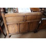 A Liberty & Co style oak single bed head and footboard, with Liberty & Co base mattress