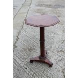 A 19th century walnut octagonal top occasional table, on faceted column and triform base, 18" wide