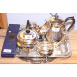 A silver plated three-piece teaset, two silver plated trays and other plate