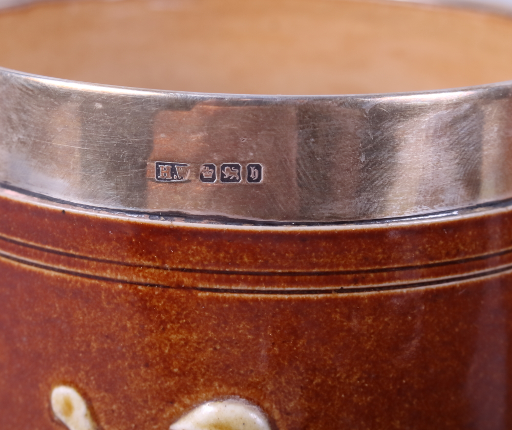 A Doulton Lambeth brown glazed pottery jug with silver rim, a similar tankard, two teapots and two - Image 3 of 5