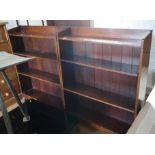 A pair of oak open bookcases with adjustable shelves, 30" wide