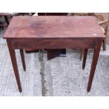 A mahogany side table, on square taper supports, 32" wide