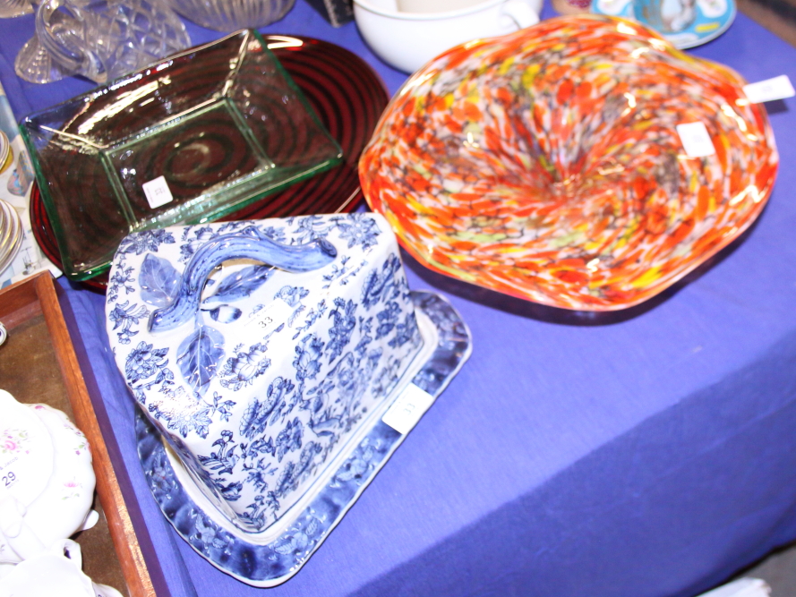 A blue and white cheese dish and cover, and three modern glass dishes/stands, various