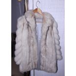 An Arctic fox fur coat, size 12
