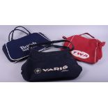 A Varig Airways bag and two other airline bags for TWA and British Airways