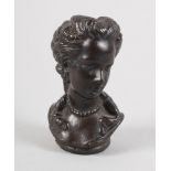 A 19th century miniature bronze bust of a classical beauty, 2 3/4" high