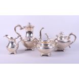 A Victorian four-piece tea and coffee set with scroll handles, engraved Rococo style decoration with