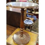 A late 19th century mahogany circular top occasional table, on turned column and circular base,