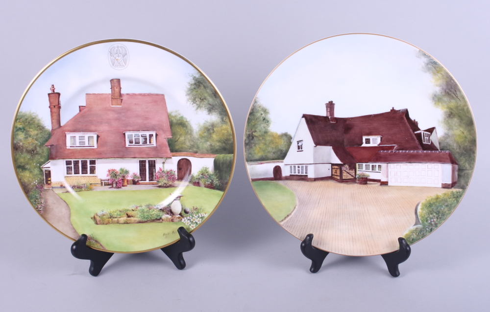 A pair of Royal Worcester bone china cabinet plates with hand-painted views of Red Roofs Evington,