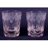 A pair of early 19th century engraved and cut glass tumblers with hanged man "last drop" bases, 4"