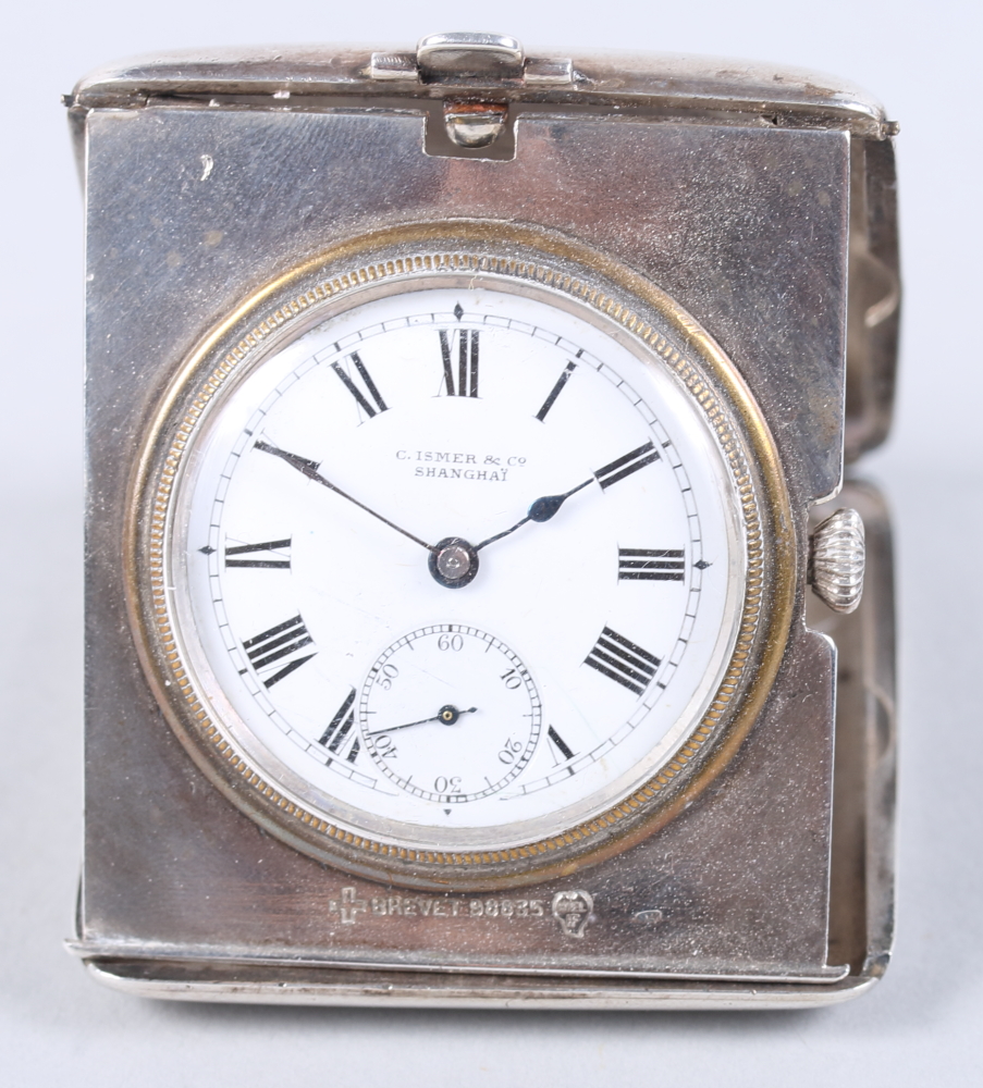 A silver cased travelling watch with engine turned decoration, white enamel dial, Roman numerals and - Bild 5 aus 7