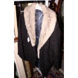 A 1930s black Persian lamb silk lined short jacket with silver mink collar, three black Persian lamb