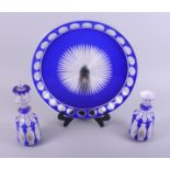 A 19th century blue and white overlaid and cut glass scent bottle and stopper, 8 1/2" high, a