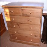 A pine chest of two short and three long drawers, on a block base, 36" wide