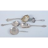 A Tiffany & Co sterling silver sifter spoon and four other spoons, various, 5.4oz troy approx