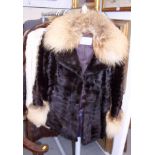 A fur coat, designed by Chombert Paris for Connaught Furs Ltd, and a full-length fur coat