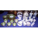 A German green and gilt part combination service, a collection of coffee cups and saucers, "The