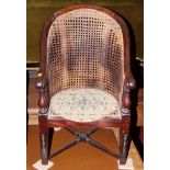 A child's 19th century chair with rattan back and seat, three foot stools and a nursing chair,