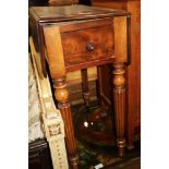 A mid 19th century walnut flap top work table, fitted one drawer, on reeded supports, 23 1/2" wide