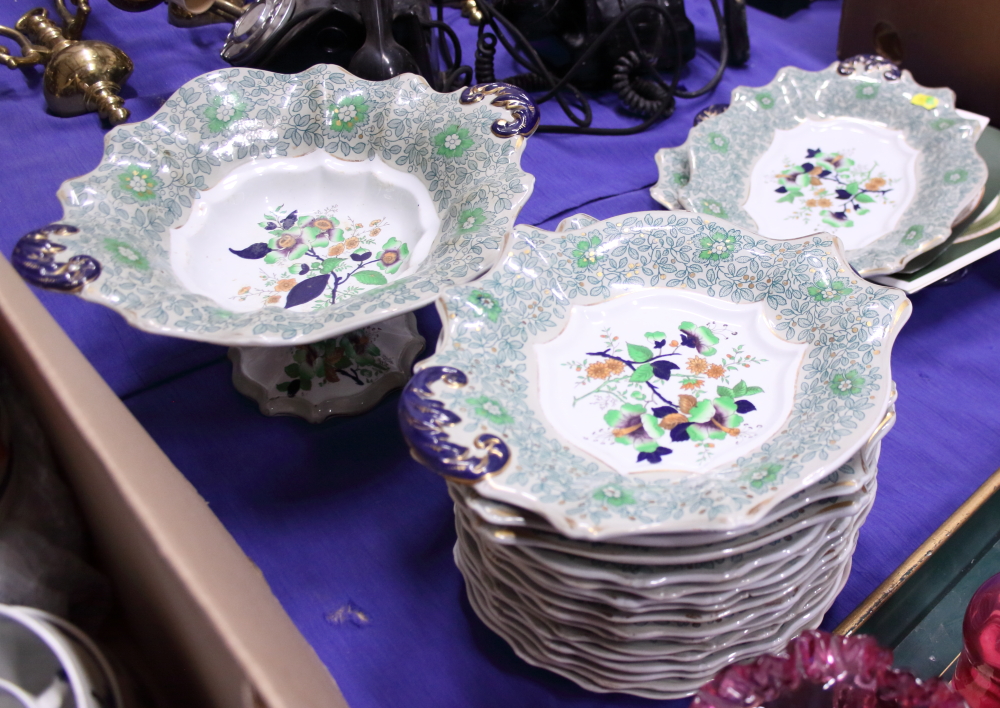 A Real Stone china dessert service with floral decoration and green borders