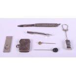 A silver fruit knife, a silver vesta case, a silver cigar cutter, two mixed metal stickpins and