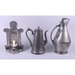 A 19th century pewter wall sconce/candle clock, a pewter coffee pot and a pewter flagon