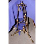 An Arts & Crafts copper and brass stand, 29" high