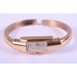 A lady's 18ct gold Siban bracelet watch with champagne dial and Arabic numerals, 16.8g gross